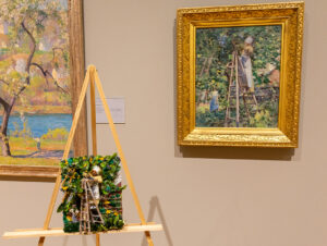 A three-dimensional model using textured materials can be used to imagine a painting of a woman on a ladder picking fruit off a tree