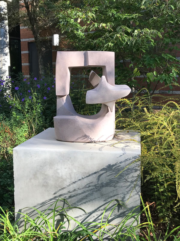 Horace Farlowe's "Tennessee Cut," a small abstract sculpture made of pale pink marble that looks like a window