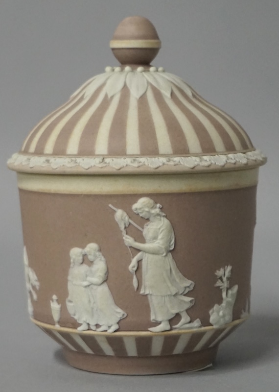 A sugar dish byWedgwood and Sons is decorated with detailed scenes.