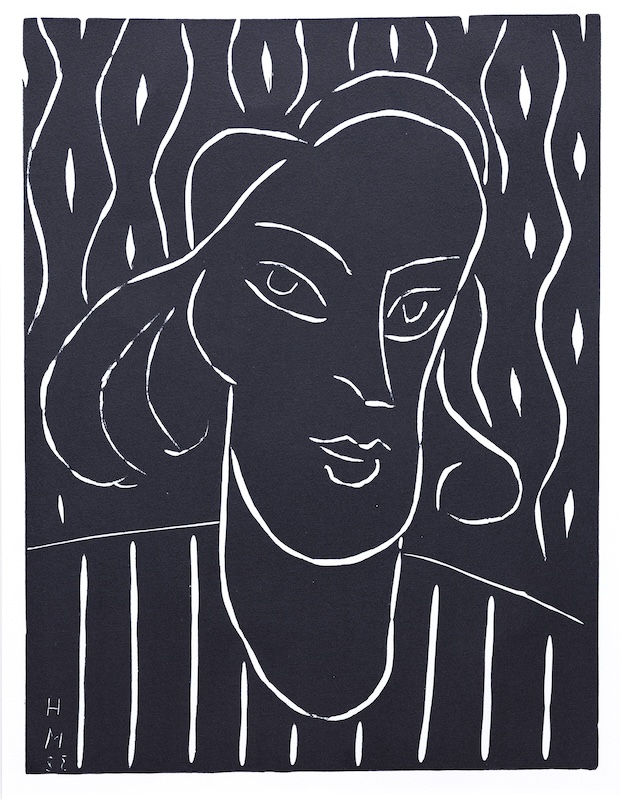 Portrait of a woman with shoulder-length hair and a striped top