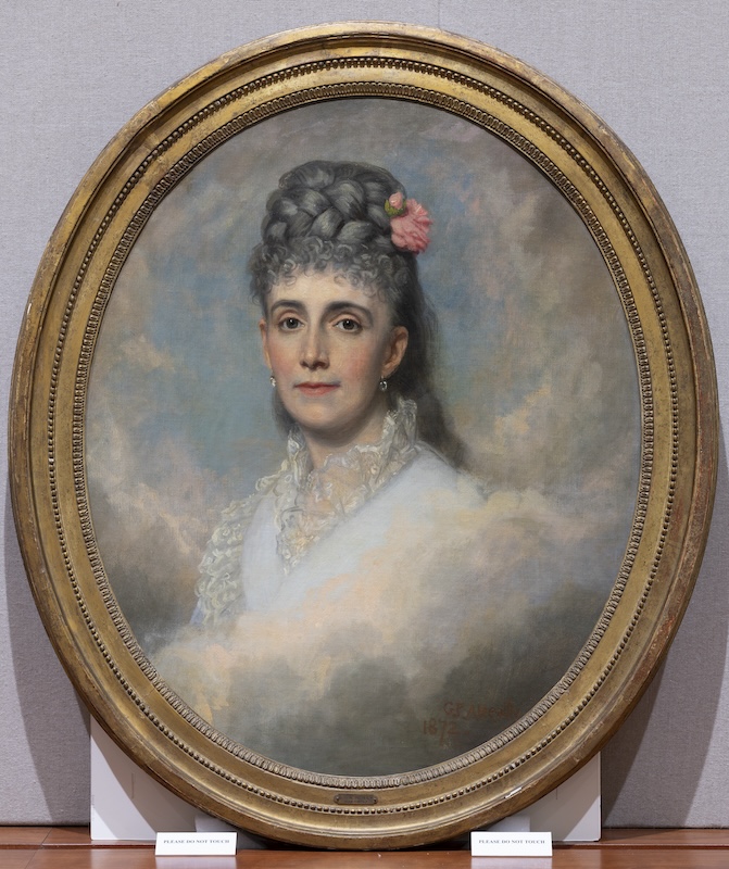 Portrait of a woman who appears to be floating in the clouds