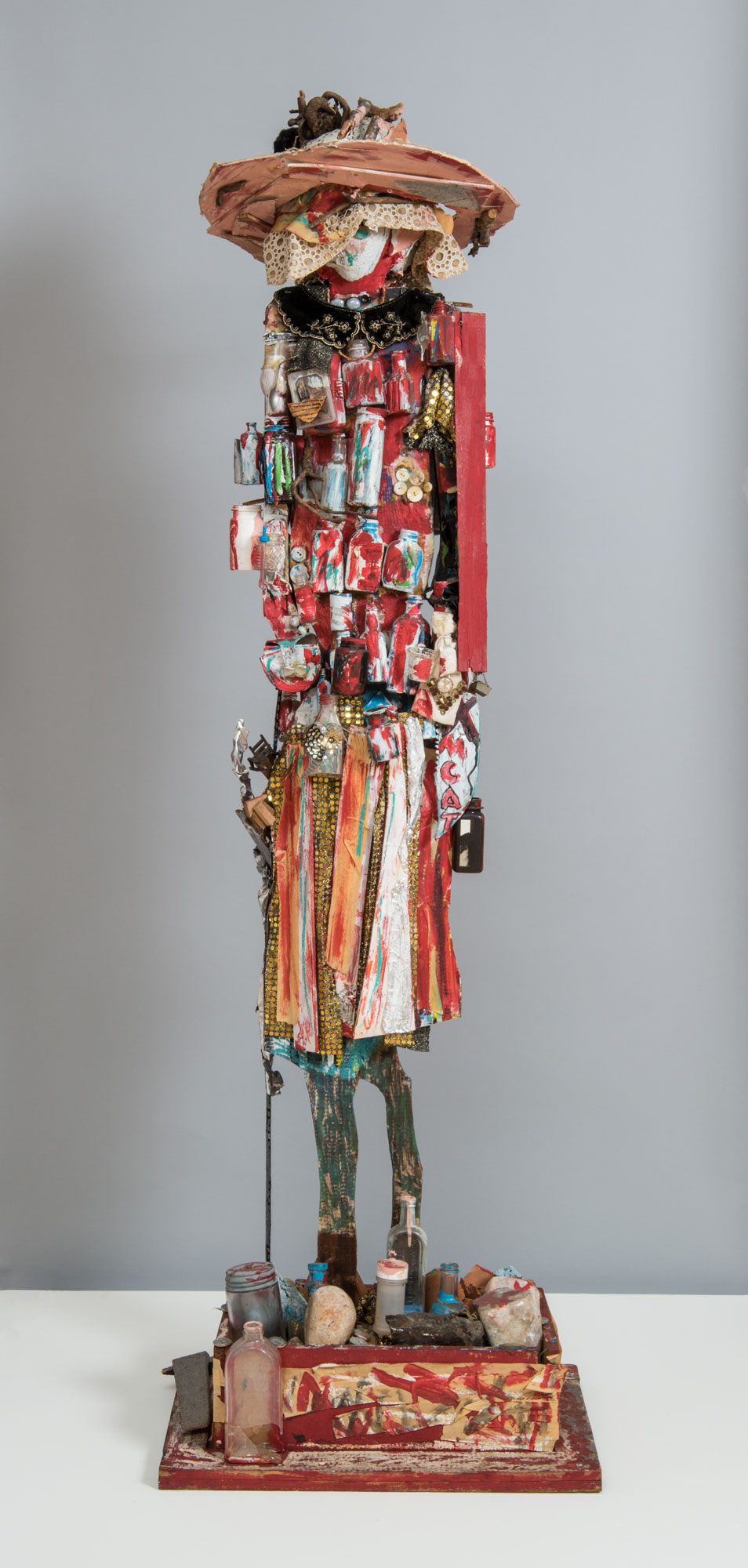 Beverly Buchanan's "Medicine Woman," a spindly sculpture made of found materials (including medicine bottles) that seems to show a woman in a dress, wearing a broad-brimmed hat and leaning on a cane.