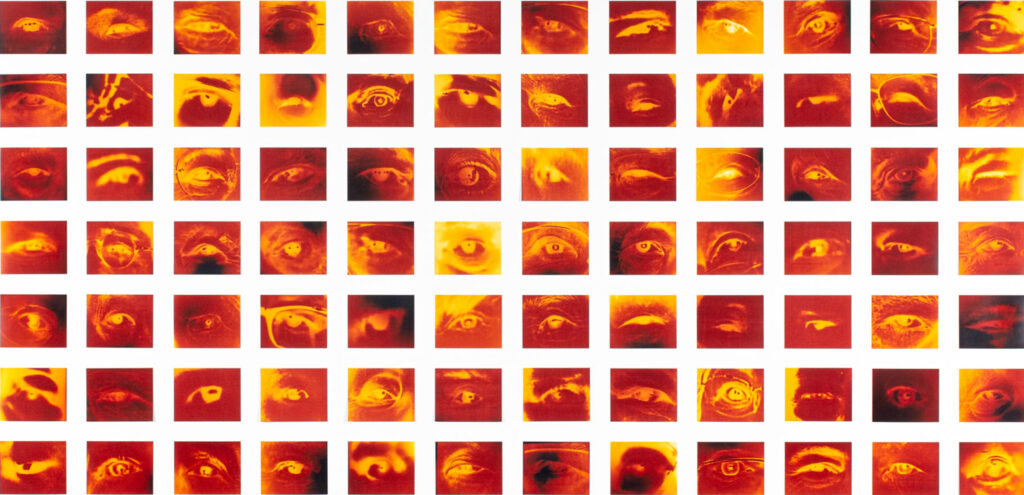a grid of photographs of eyes, rendered in red and yellow