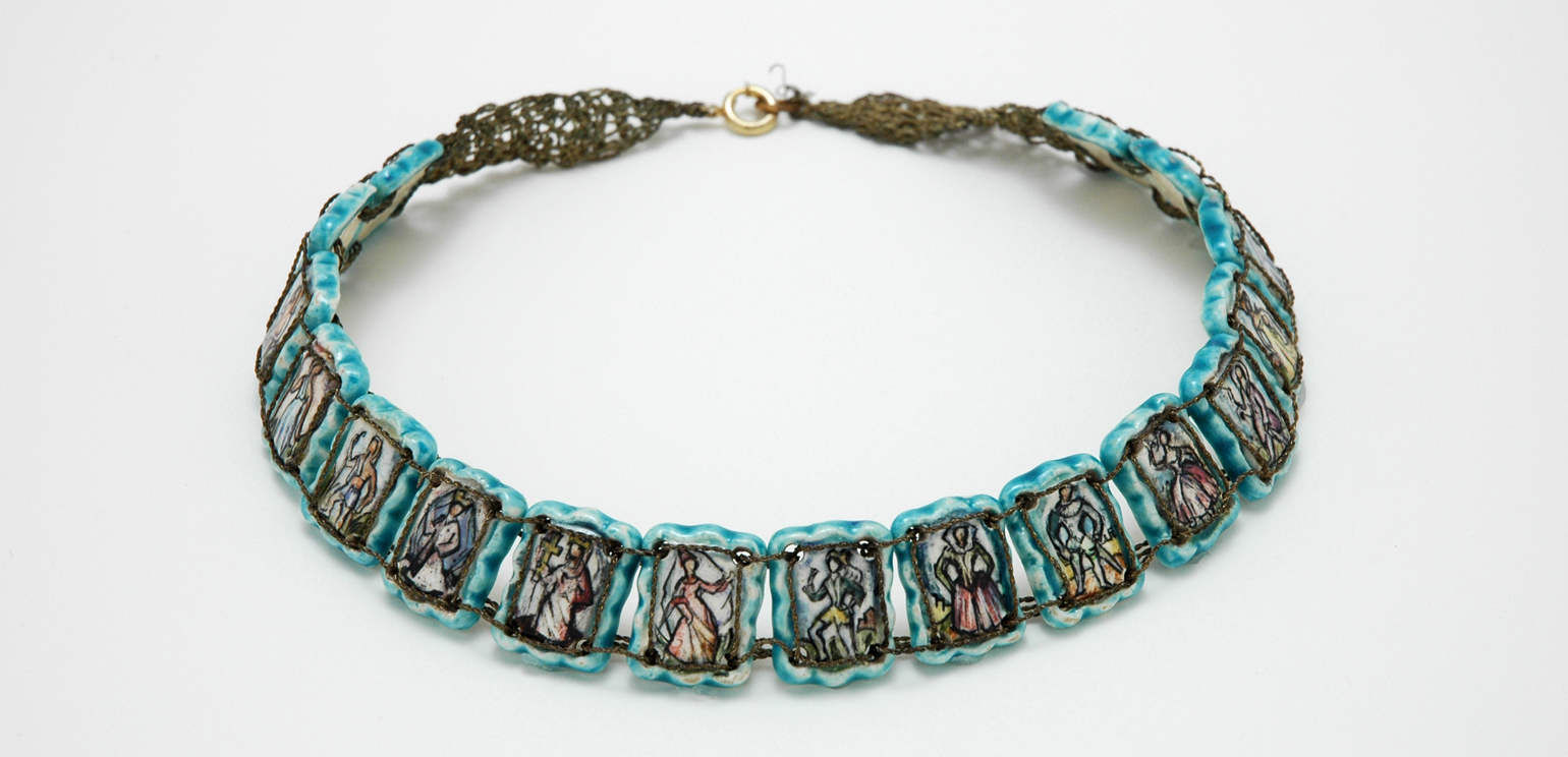 Alice Fischer's necklace "The History of Fashion," featuring individual hand-crafted beads that show different forms of dress