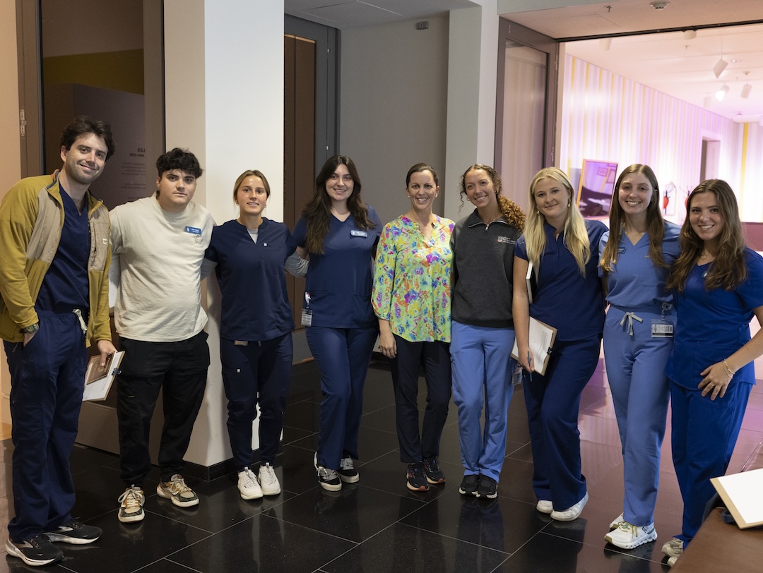 Students from UGA's College of Veterinary Medicine stand together for a group photo