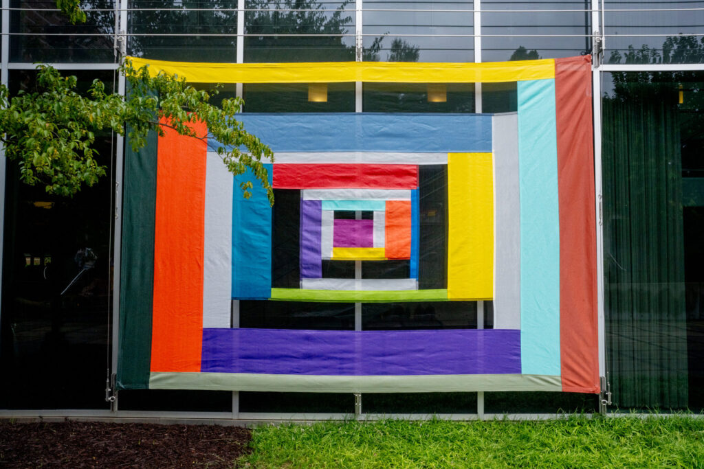 Installation photograph of “Looking Through a Sewn Sky: Rachel Hayes” by Jason Thrasher.