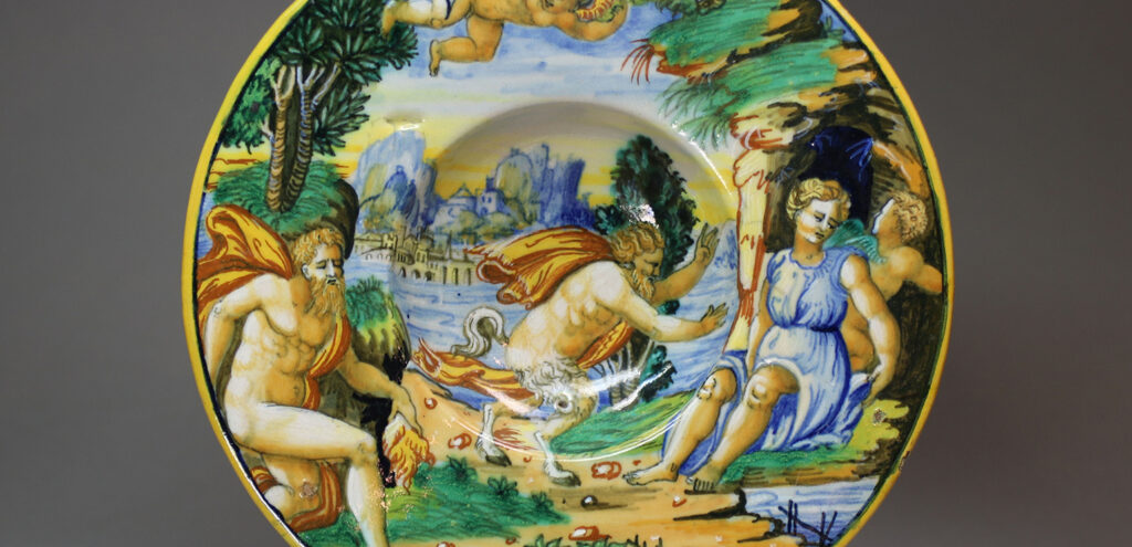 Detail of a majolica plate from the workshop of Guido Durantino that shows Jupiter surprising Antiope.