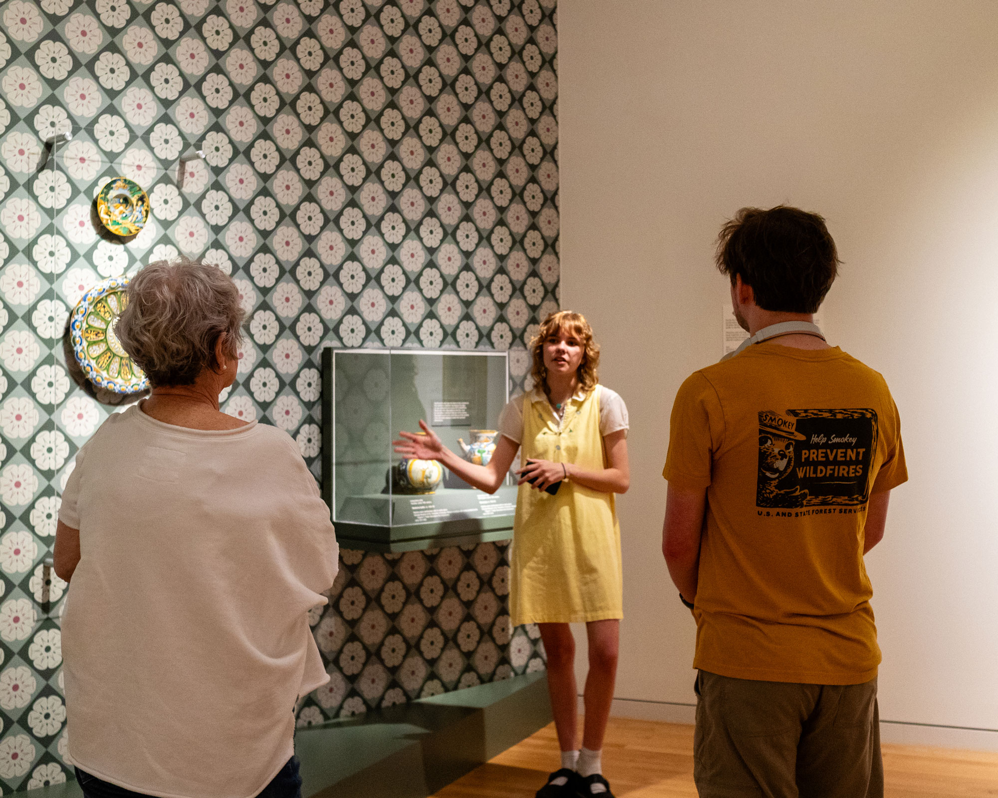 A student guide leading a tour in the galleries