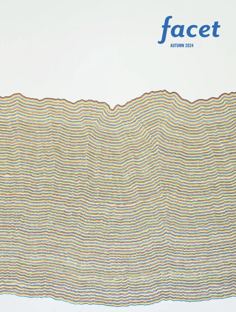 Sol LeWitt's "Wall Drawing #869" consists of lines drawn in red, yellow and blue marker horizontally across the wall