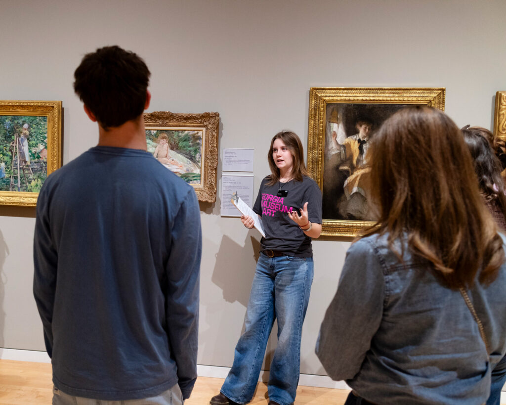 A student guide giving a tour in the galleries