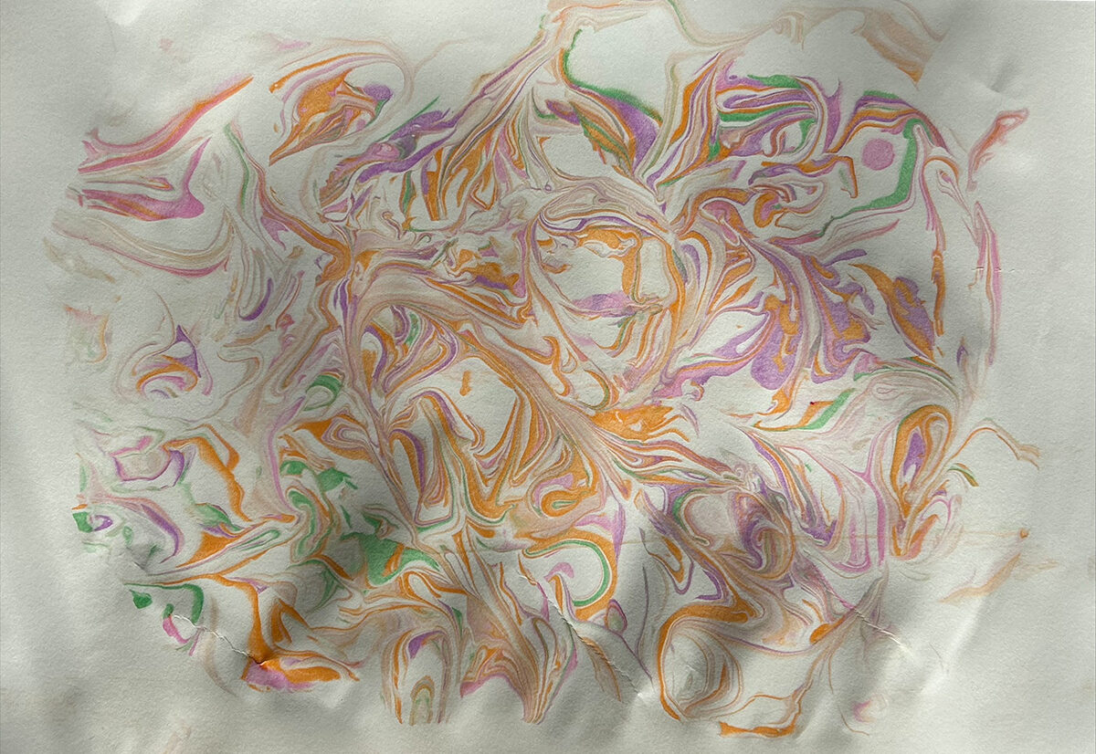 Swirled ink on paper transferred from on top of shaving cream.