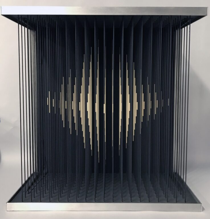 Yvaral's sculpture "Instability Number 18" is a square shaped work made up of rows of thin cords. The cords are painted to create an optical illusion of a four-sided pyramid that comes into focus based on the viewer's position.