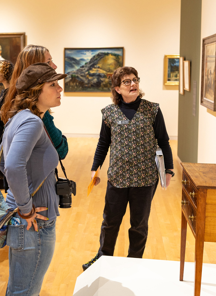 A docent giving a tour in the galleries