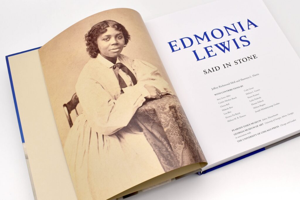 The opening page of "Edmonia Lewis: Said in Stone," showing a portrait of the artist on the left side and a list of contributors on the right side.