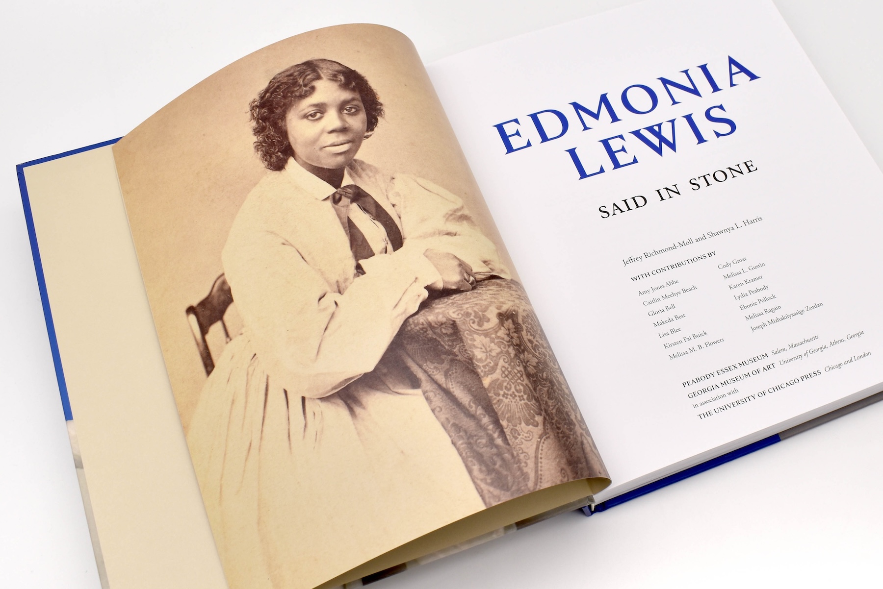 The opening page of "Edmonia Lewis: Said in Stone," showing a portrait of the artist on the left side and a list of contributors on the right side.
